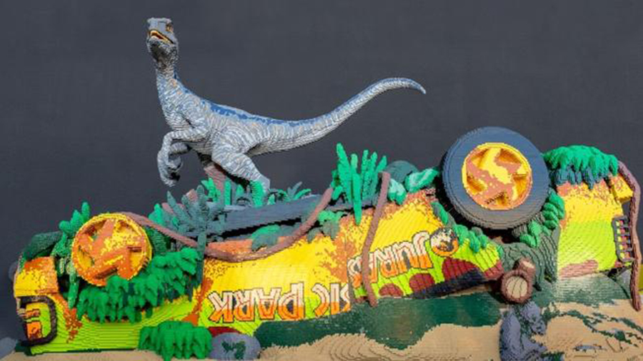 See Blue, and a vehicle that's been dino'd, in "life-size" form, via hundreds of thousands of LEGO bricks, at the Natural History Museum of Los Angeles.