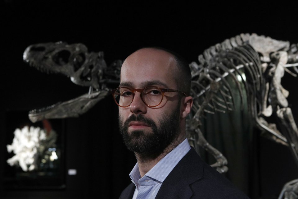 The dinosaur skeleton of an Allosaurus Jimmadseni was purchased for close to $3 million Cdn at an auction in Paris. (Francois Mori/The Associated Press)